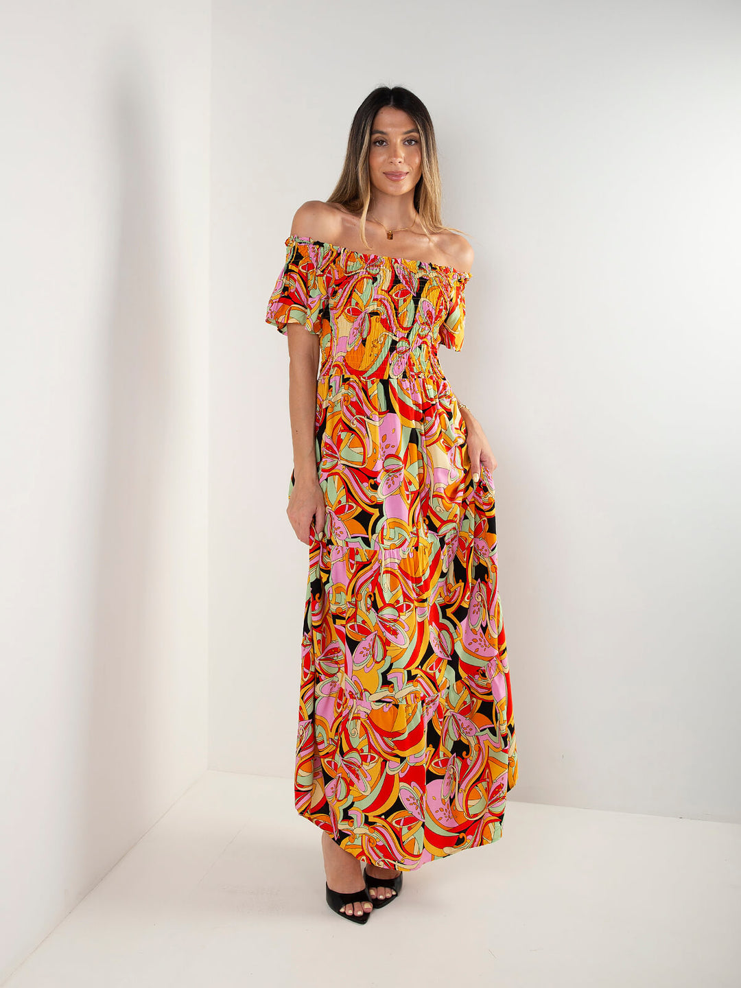 Vestido comprido estampado com decote barco